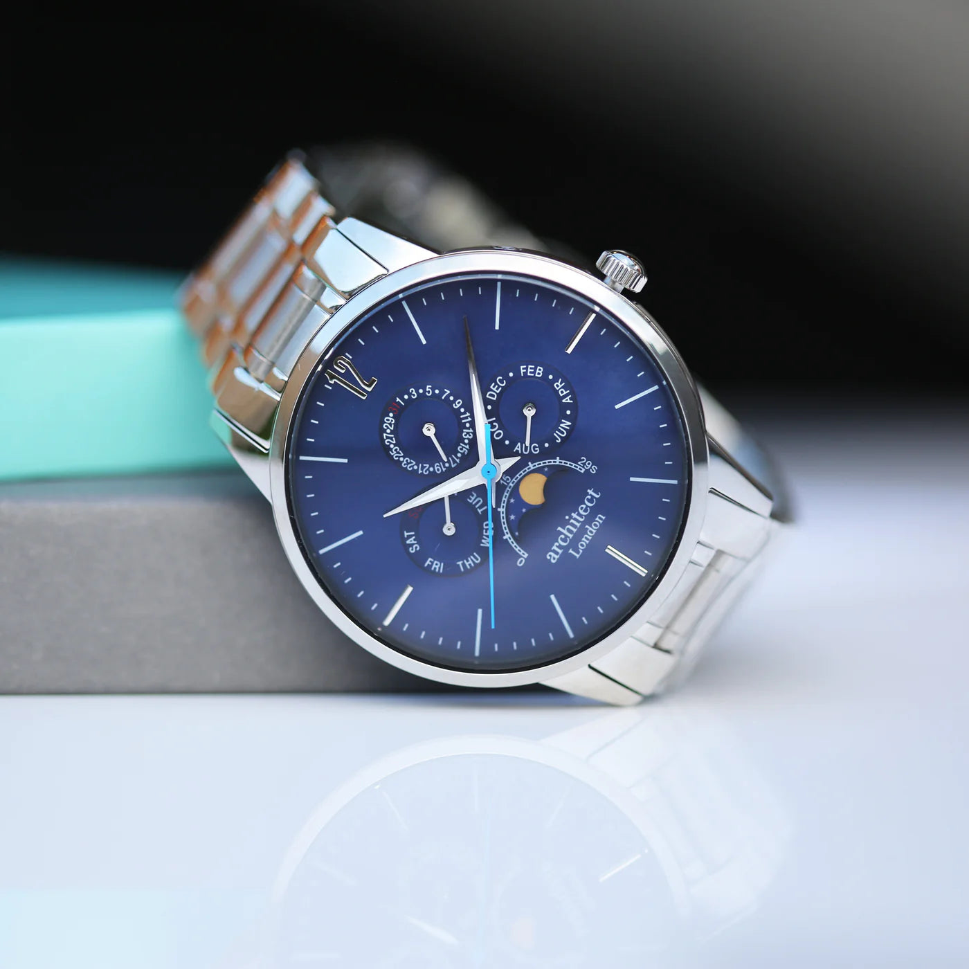 Image of a men's Architect Apollo Moonphase watch with a stainless steel strap and a blue face. The rear of the watch can be engraved with your own handwritten message or drawing.