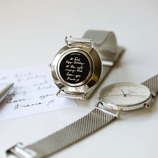 Image of a men's Architect Zephyr watch with a white face and a stainless streel mesh strap. The back of the watch can be engraved with your own handwritten message or drawing.