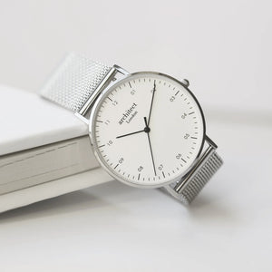 Image of a men's Architect Zephyr watch with a white face and a stainless streel mesh strap. The back of the watch can be engraved with your own handwritten message or drawing.