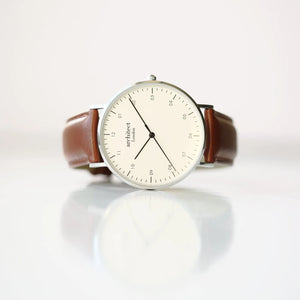 Image of a men's Architect Zephyr watch with an off white face and a walnut leather strap. The rear of the watch can be engraved with your own handwritten message or drawing.
