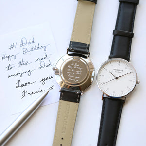 Image of a men's Architect Zephyr watch with a white face and black leather strap. The back of the watch can be engraved with your own handwritten message or drawing.