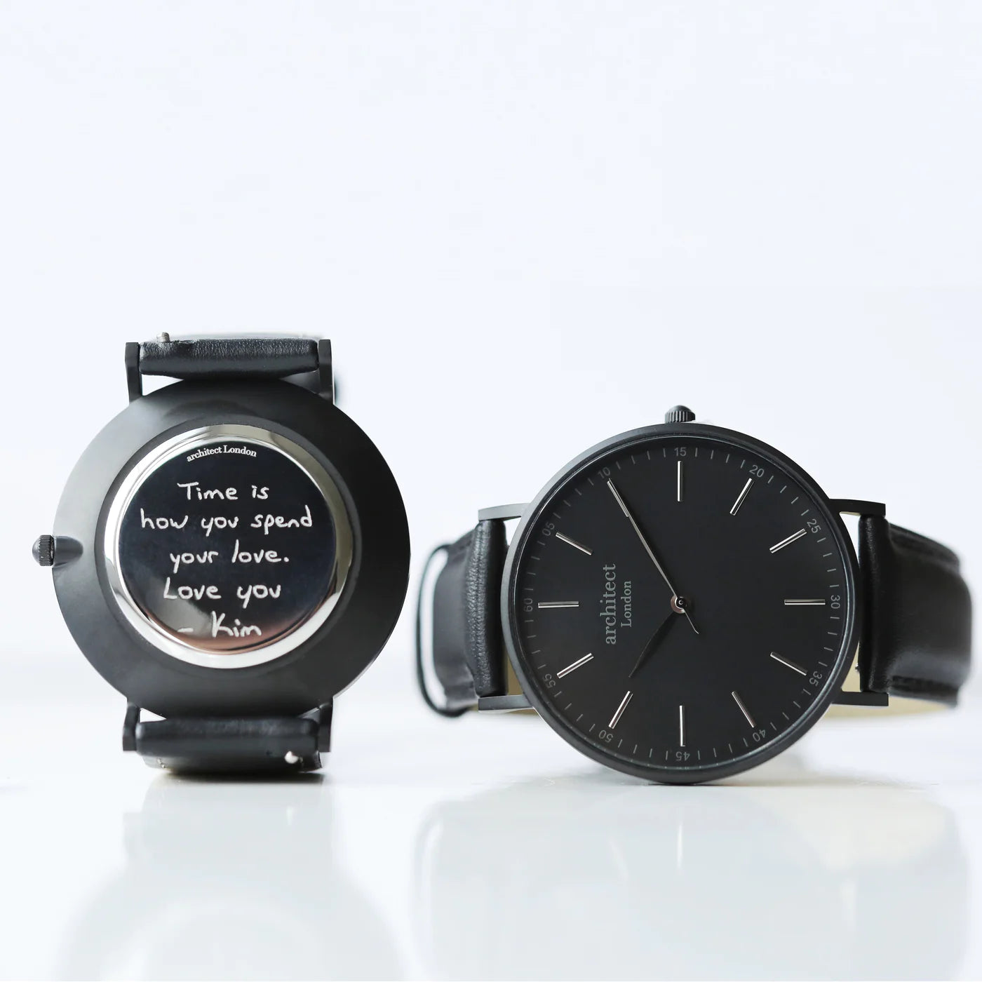 Image of a men's black Architect watch with a black face and leather strap. The back of the watch can be engraved with your own handwritten message or drawing.