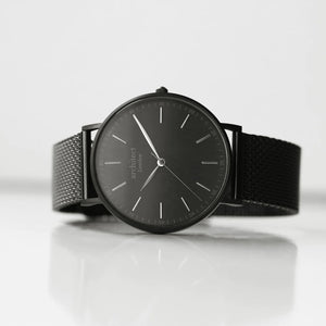 Image of a men's black Architect watch wtih a black face and black mesh strap. The back of the watch can be engraved with your own handwritten message or drawing.