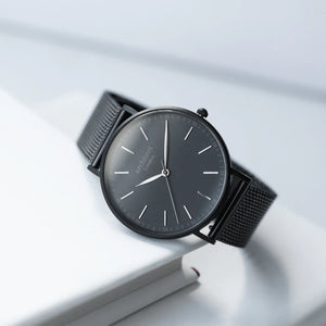 Image of a men's black Architect watch wtih a black face and black mesh strap. The back of the watch can be engraved with your own handwritten message or drawing.