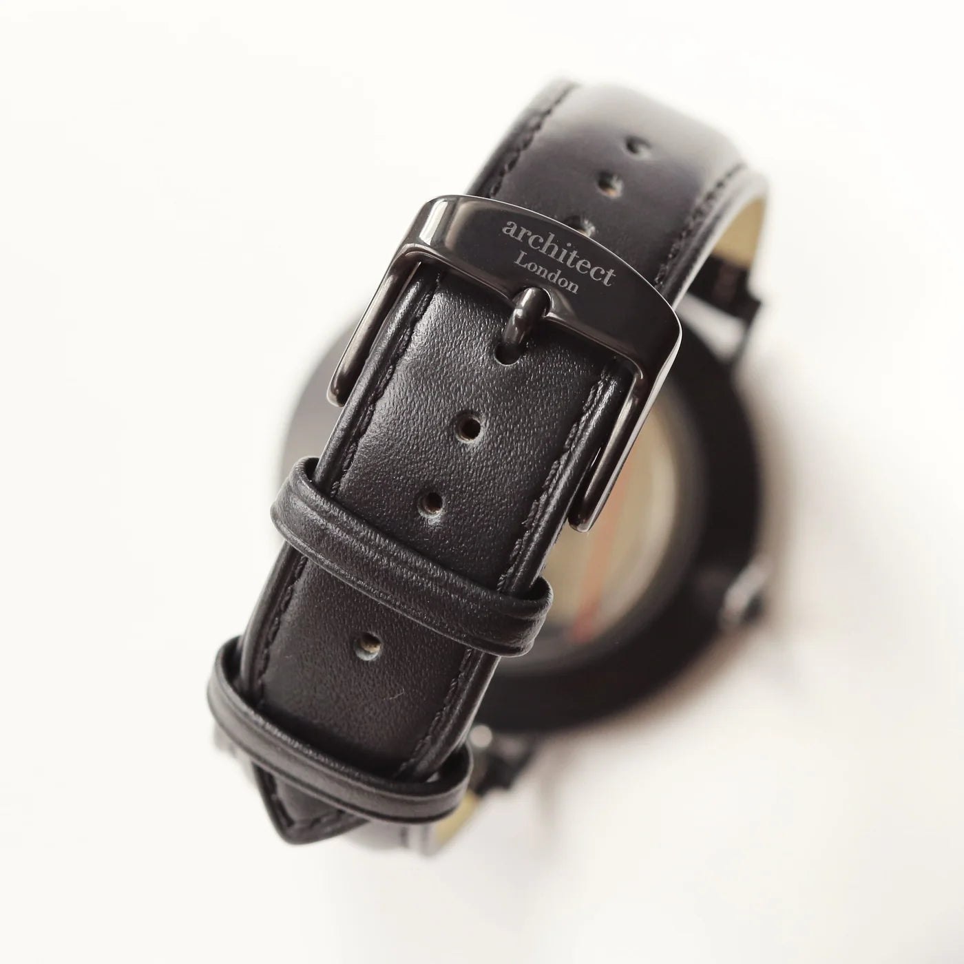 Image of a men's black Architect watch with a black face and leather strap. The back of the watch can be engraved with your own handwritten message or drawing.