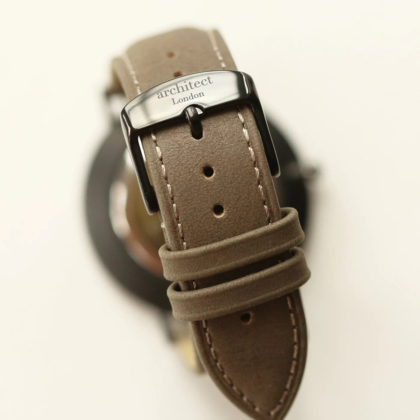 Image of a men's Architect watch with a black face and urban grey leather strap. The back of the watch can be engraved with your own handwritten name or message.