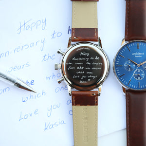 Image of a men's Architect Motivator watch that can be engraved with your own handwritten message on the back. The watch has a face and a brown leather strap.