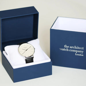 Image of a men's Architect Zephyr watch with a white face and black leather strap. The back of the watch can be engraved with your own handwritten message or drawing.