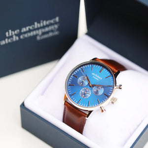 Image of a men's Architect Motivator watch that can be engraved with your own handwritten message on the back. The watch has a face and a brown leather strap.