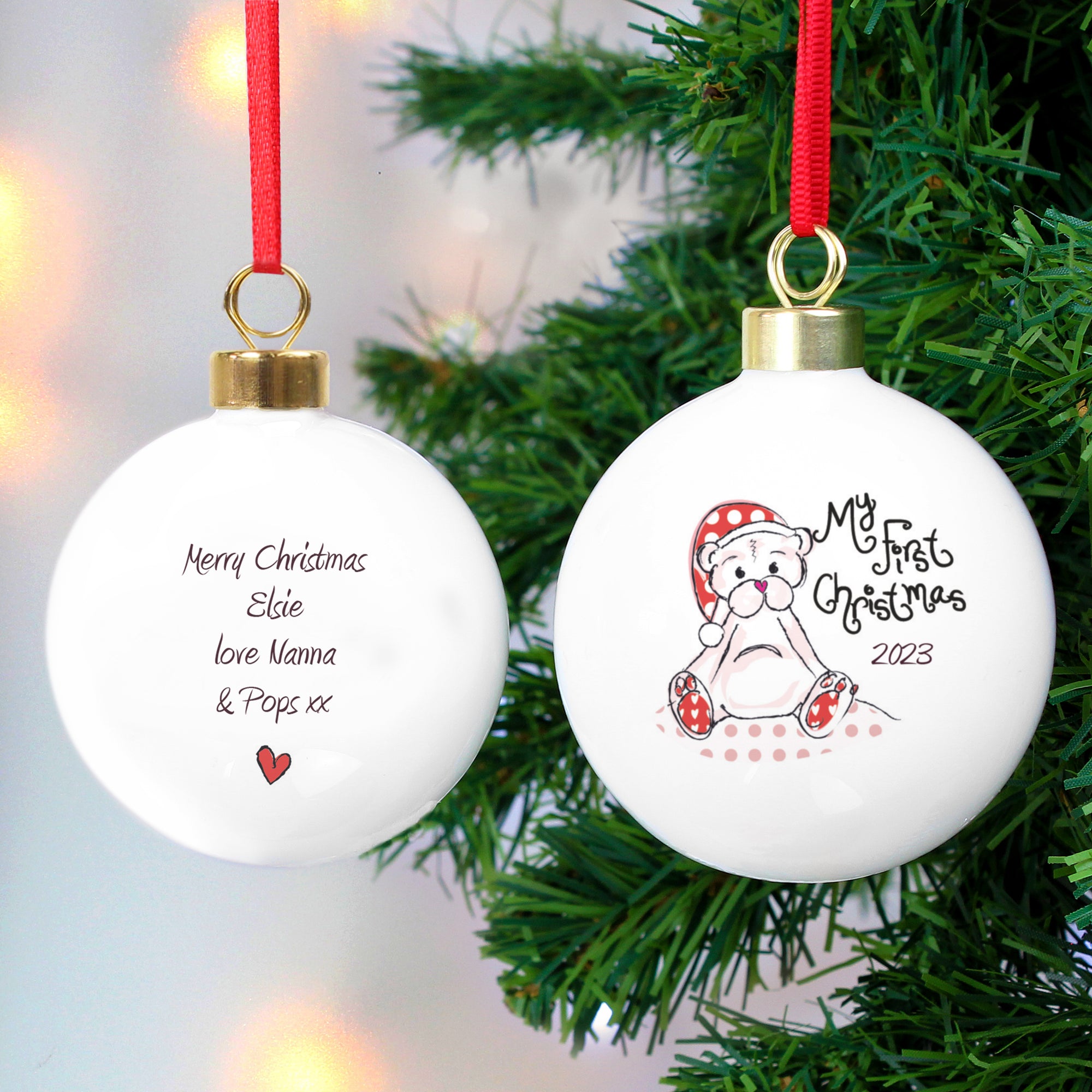 Personalised 'My First Christmas' bauble featuring an image of a hand-drawn bear wearing a Christmas hat on the front of the bauble with the wording 'My First Christmas'. You can also add a year of your choice to the front of the bauble and the rear can be personalised with a message of your choice over up to 4 lines.
