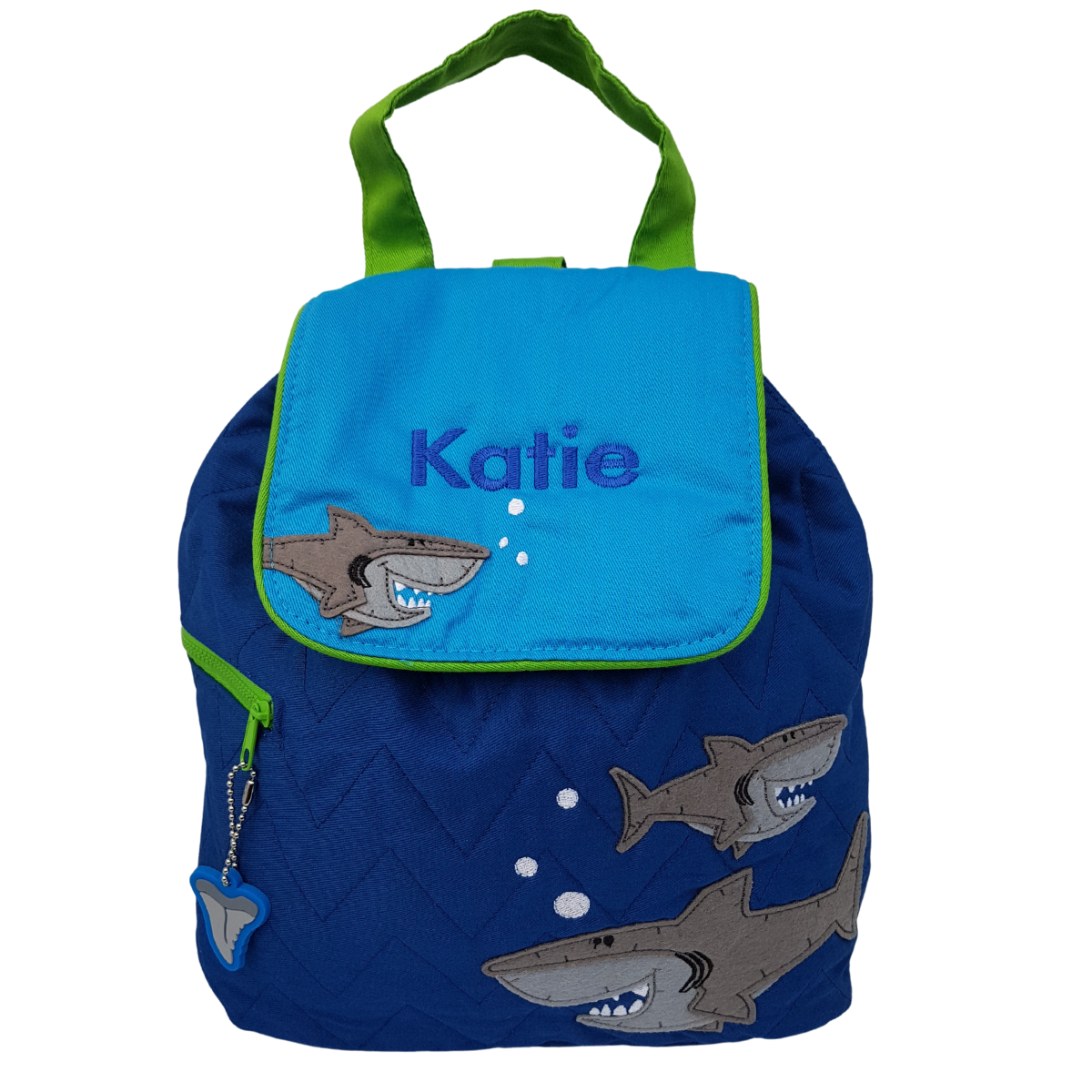 Personalised Stephen Joseph shark child's backpack made from royal blue quilted fabric with a grey shark design on the front. The opening flap which is mid blue can be embroidered with a name of your choice