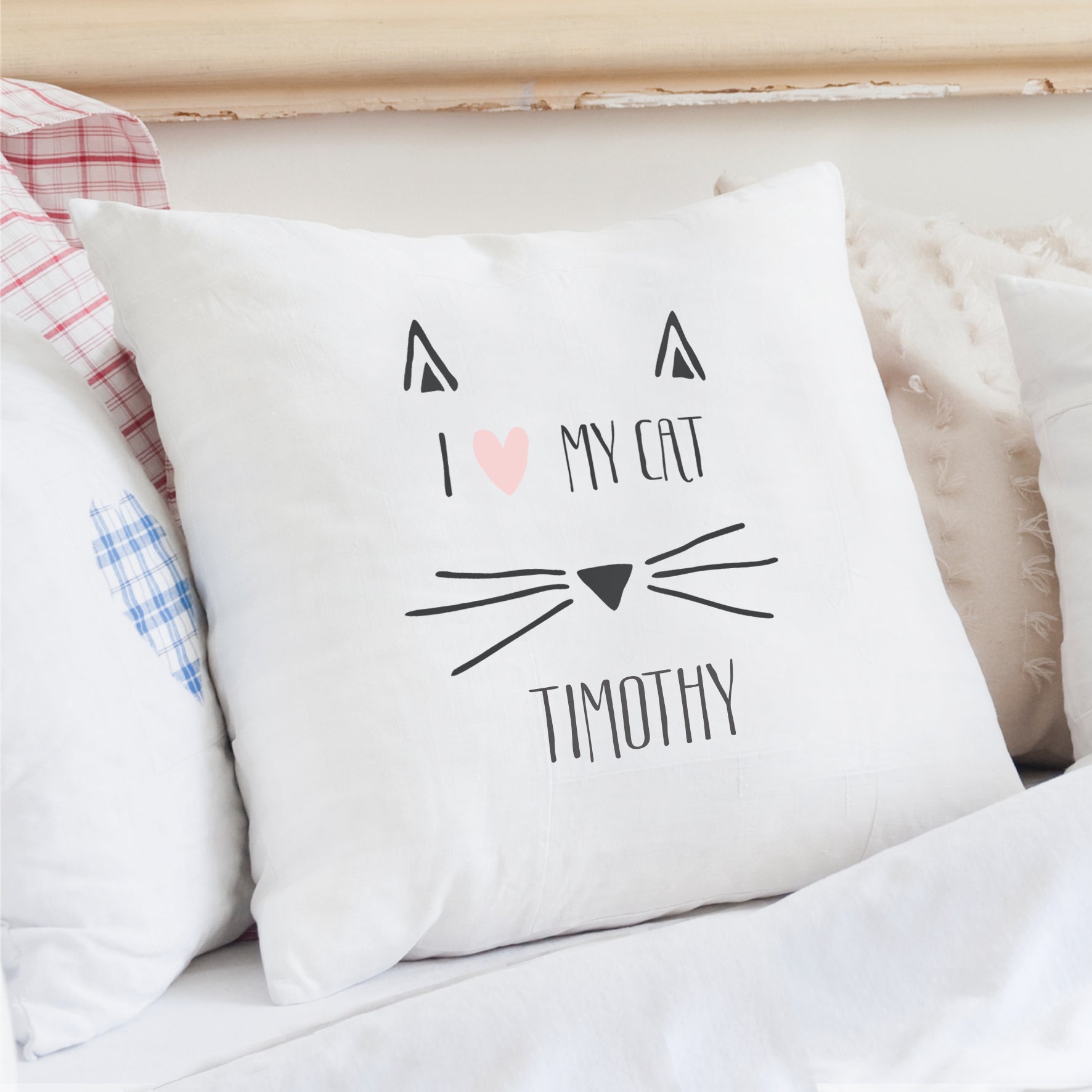 Image of a cushion cover which can be personalised with "I love my cat" and a name of your choice