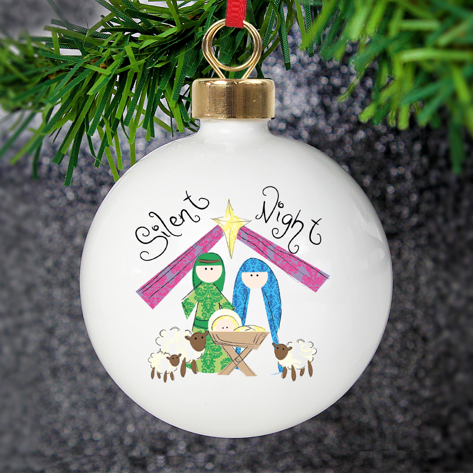 Personalised White Ceramic China Christmas Bauble featuring the text 'Silent Night' and a hand drawn nativity scene.  The rear of the bauble can be personalised with your own message over 4 lines.