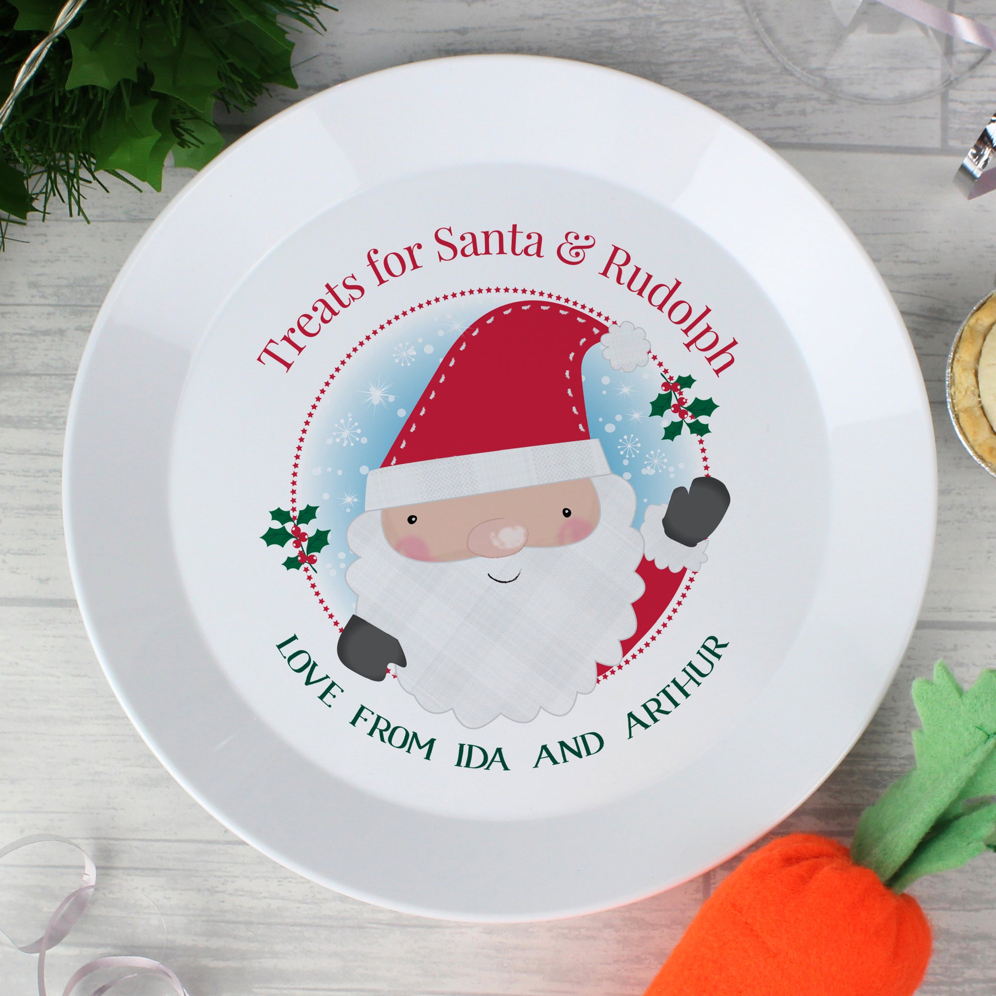 Personalised Christmas Eve plate featuring a large image of Father Christmas in the centre, which can be personalised with your own text of up to 25 characters. Made from shatter-proof white plastic. preparations for Father Christmas's visit!  Featuring a large image of Father Christmas in the centre of the plate, there is space underneath the image for your own personalisation of up to 25 characters.   