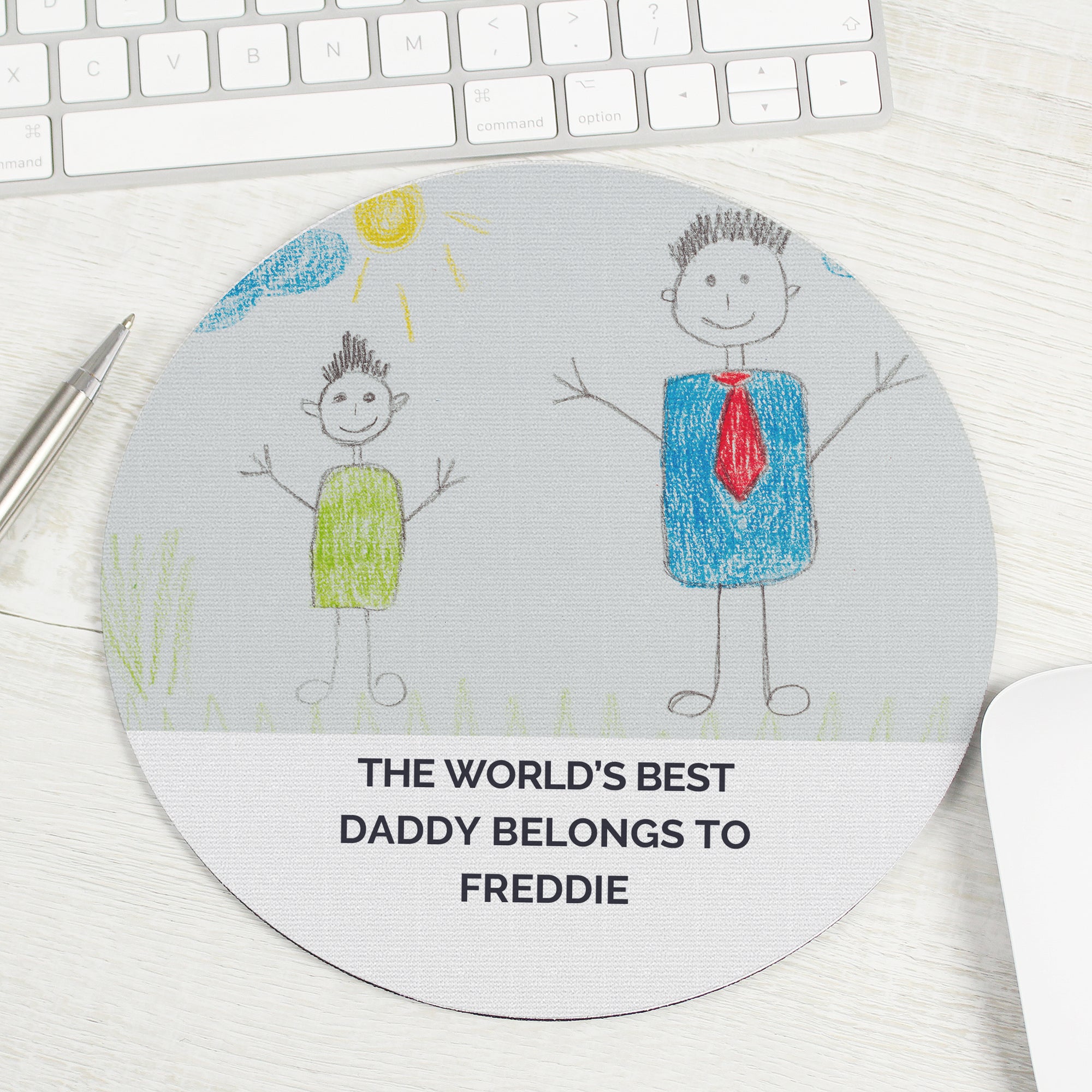 Image of a round mouse mat that can be personalised with your childs own art work. You can choose to have the artwork fill the entire mouse mat or you can add your own text which will be printed underneath the artwork.