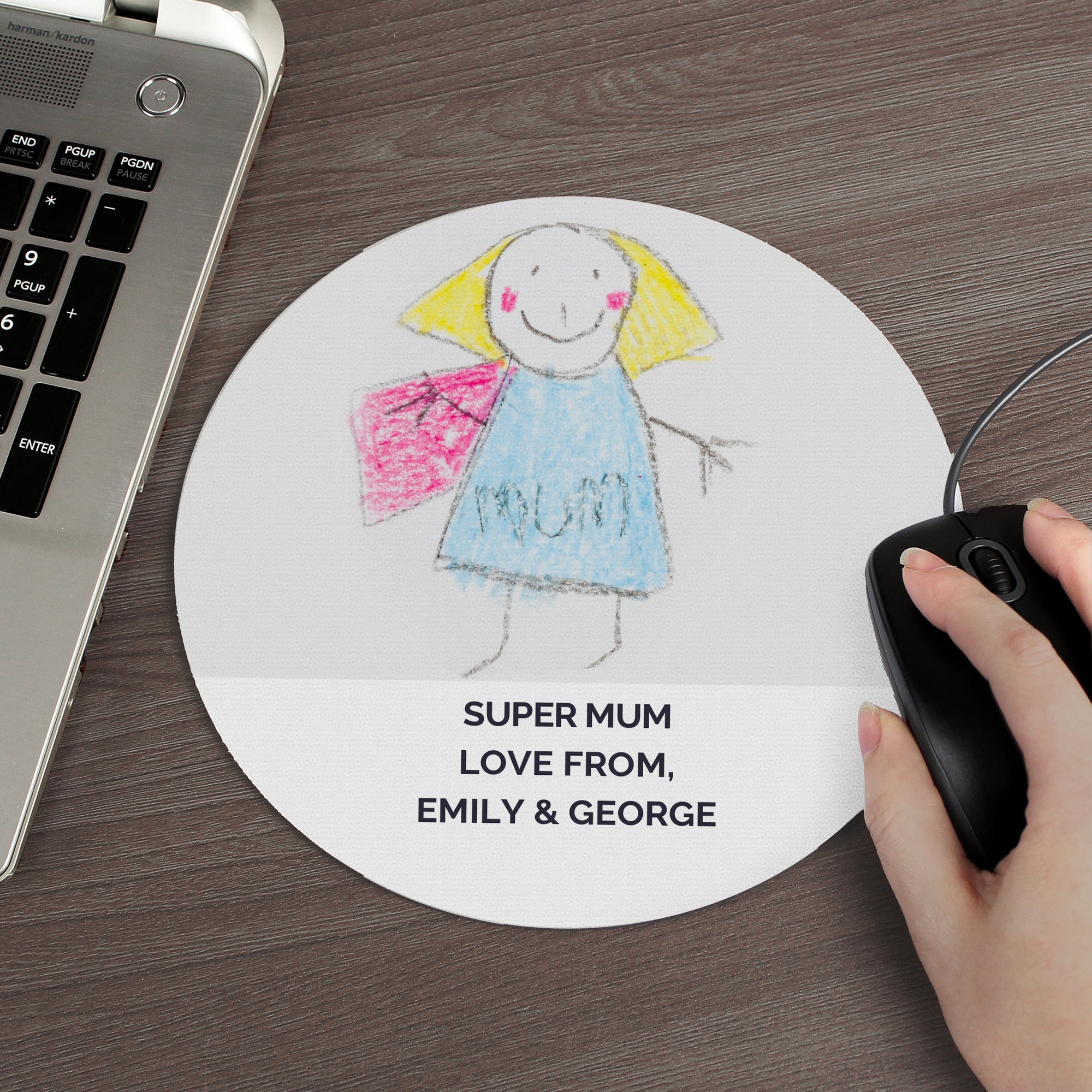 Image of a round mouse mat that can be personalised with your childs own art work. You can choose to have the artwork fill the entire mouse mat or you can add your own text which will be printed underneath the artwork.