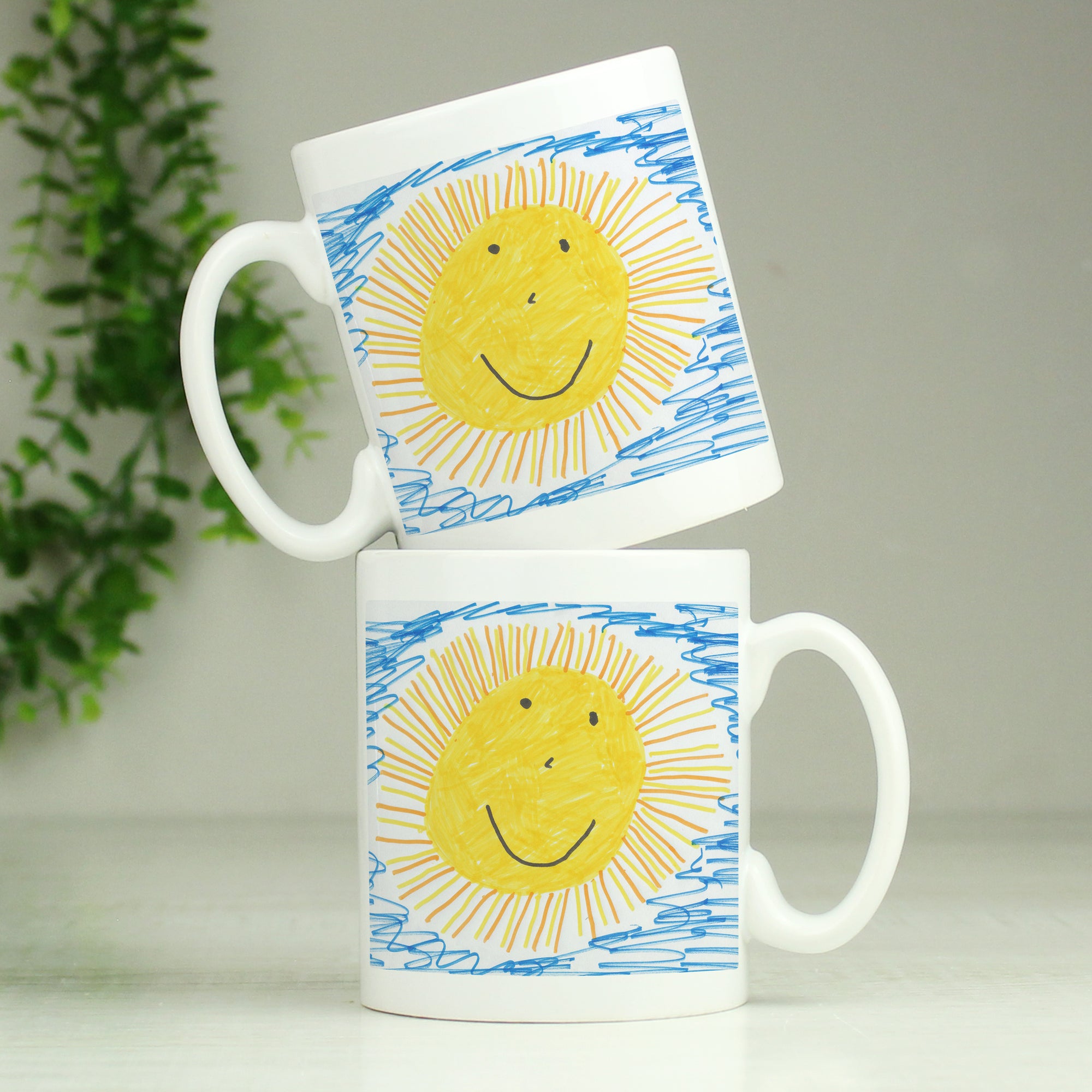 Image of a mug that can be printed with your child's own drawing on the front of the mug. You can choose to add your own message on the back of the mug or the drawing can also be printed on the reverse as well as the front.