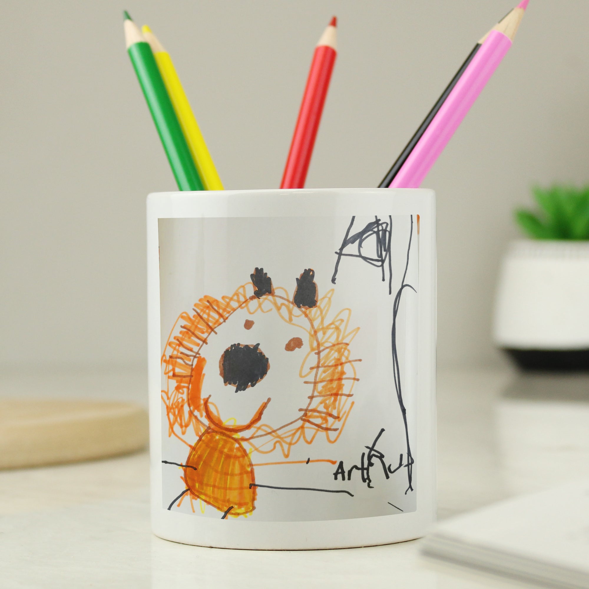 Image of a white ceramic storage pot that can be personalised with your child's own artwork and two lines of optional text.