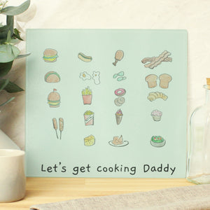 Image of a glass chopping board that can be personalised by having your child's own drawing printed on it and underneath the drawing, you can choose to add your own message or text which will be printed in a black handwritten style font.