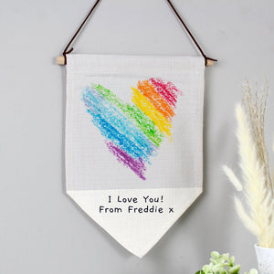 Image of a linen hanging banner that can be printed with your child's own artwork. There is also space under the artwork to add your own text over 2 lines which will be printed in a black handwritten style font.