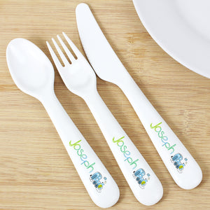 Image of a plastic BPA free child's cutlery set. The cutlery set comprises of a spoon, fork and knife that are white and there is an image of a blue and green train at the end of the handle. The handles can also be personalised with a name of your choice of up to 12 characters which will be printed in green and blue.