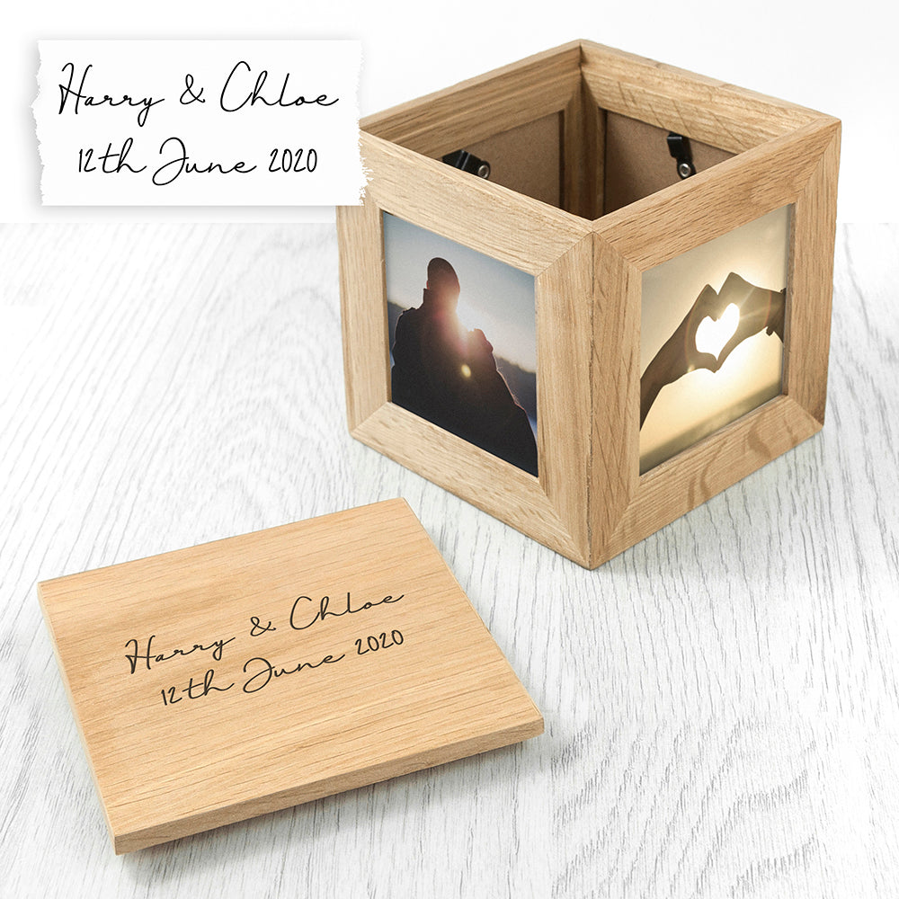 Image of an oak photo cube and keepsake box. You can put a photo into each of the four sides of the cube and the lid of the cube can be engraved with your own handwritten message. The inside of the box can be used to store small mementos.