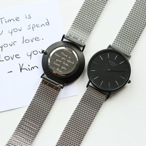 Front and rear image of a men's watch that can be engraved on the back with your own handwriting. The watch is made by Architect London and has a large black face and a stainless steel mesh strap. The rear of the watch can be engraved with your message written in your own handwriting.