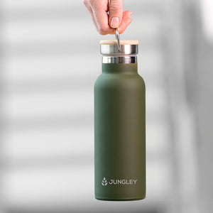 Personalised matt green insulated drinks bottle with a double wall and a bamboo vacuum screw top lid. The side of the bottle can be engraved with a name of your choice in uppercase.