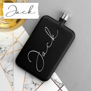 Image of a personalised black slimline hip flask with a screw top lid that can be personalised with your own handwritten message printed in white.