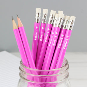 Set of 12 personalised HB pink pencils topped with an eraser and with a small heart motif after the name.