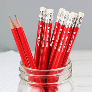 Pack of 12 personalised writing HB pencils with a red outer and an eraser on the end. Each pencil is personalised with a name and a star motif.