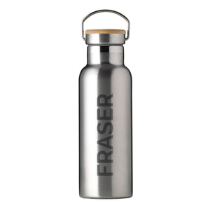 Personalised insulated drinks bottle in stainless steel. The bottle has a leak proof bamboo vacuum sealed lid and a carry handle. The bottle can be personalised in a name of your choice which will be printed down the side of the bottle in large uppercase letters.