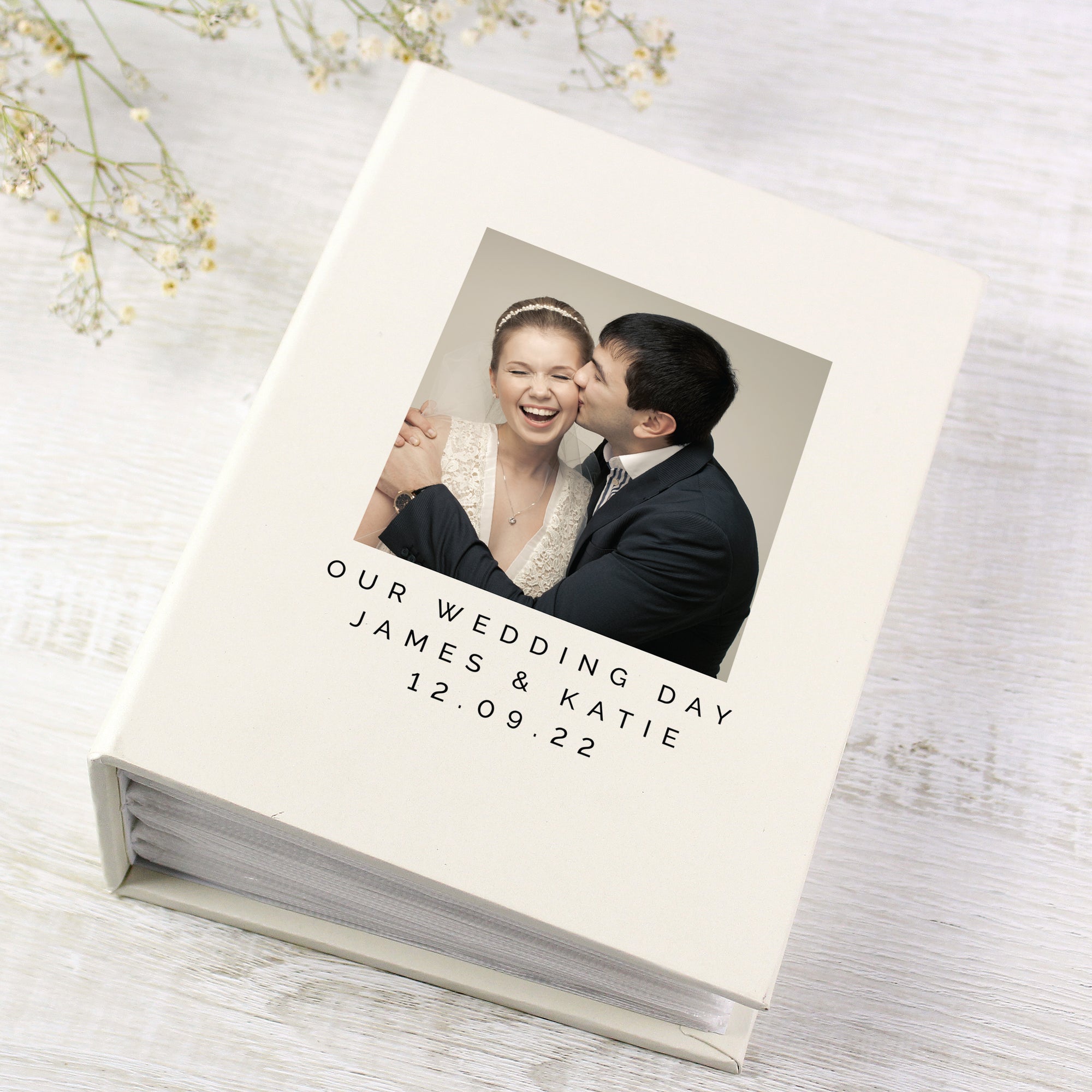 Image of a photo album where the front cover can be personalised with your own photo plus your own text over 3 lines of up to 20 characters per line which will be printed in uppercase. Internally the album can hold up to 100 6" by 4" photos.