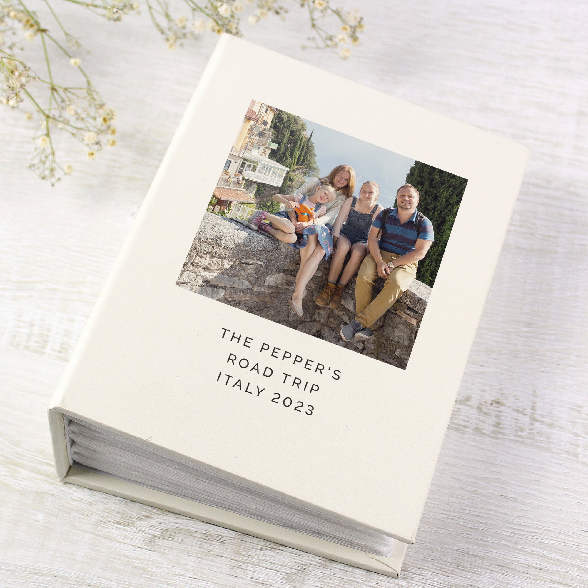 Image of a photo album where the front cover can be personalised with your own photo plus your own text over 3 lines of up to 20 characters per line which will be printed in uppercase. Internally the album can hold up to 100 6" by 4" photos.