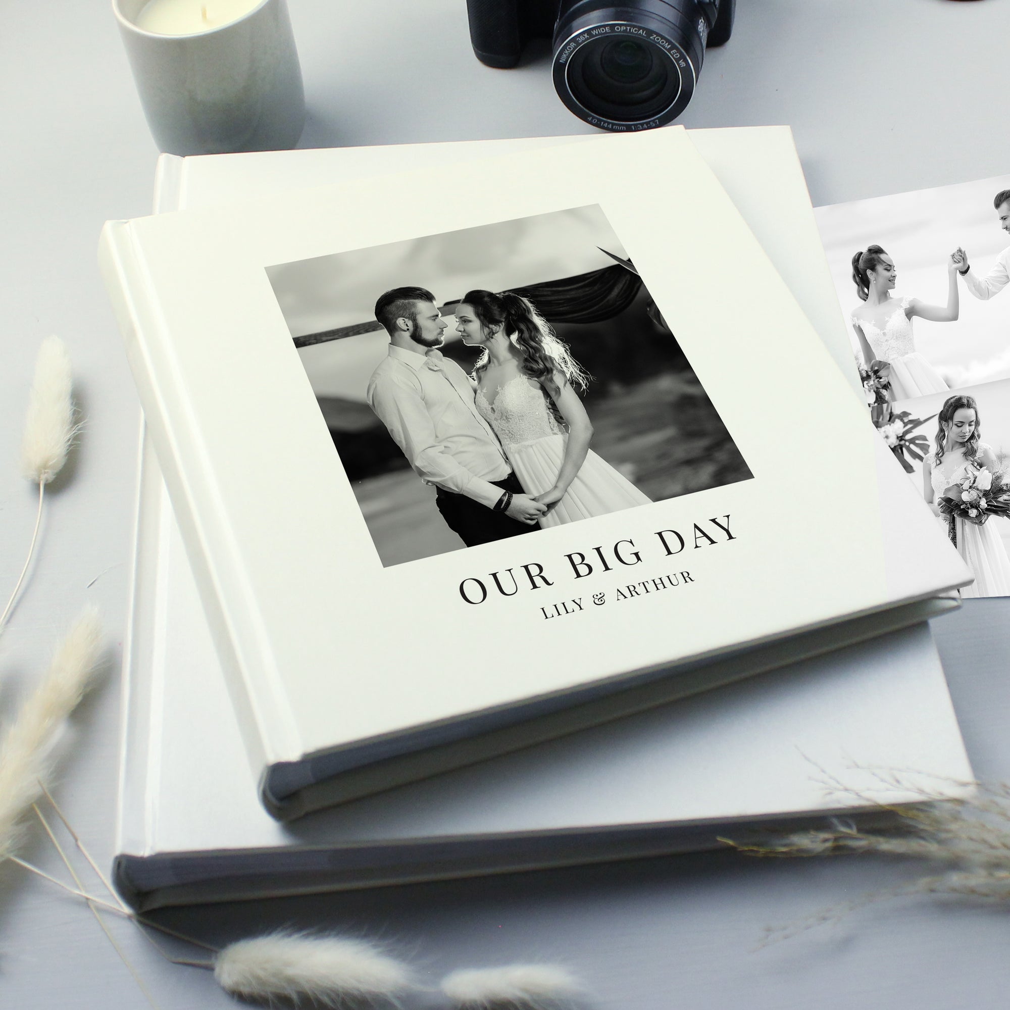 Image of a white square photo album which can be personalised on the front cover with your own photo as well as your own text over 2 lines. Internally the album holds up to 120 6" by 4" photos with space by each one for your own handwritten comments.