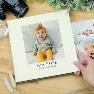 Image of a white square photo album which can be personalised on the front cover with your own photo as well as your own text over 2 lines. Internally the album holds up to 120 6" by 4" photos with space by each one for your own handwritten comments.
