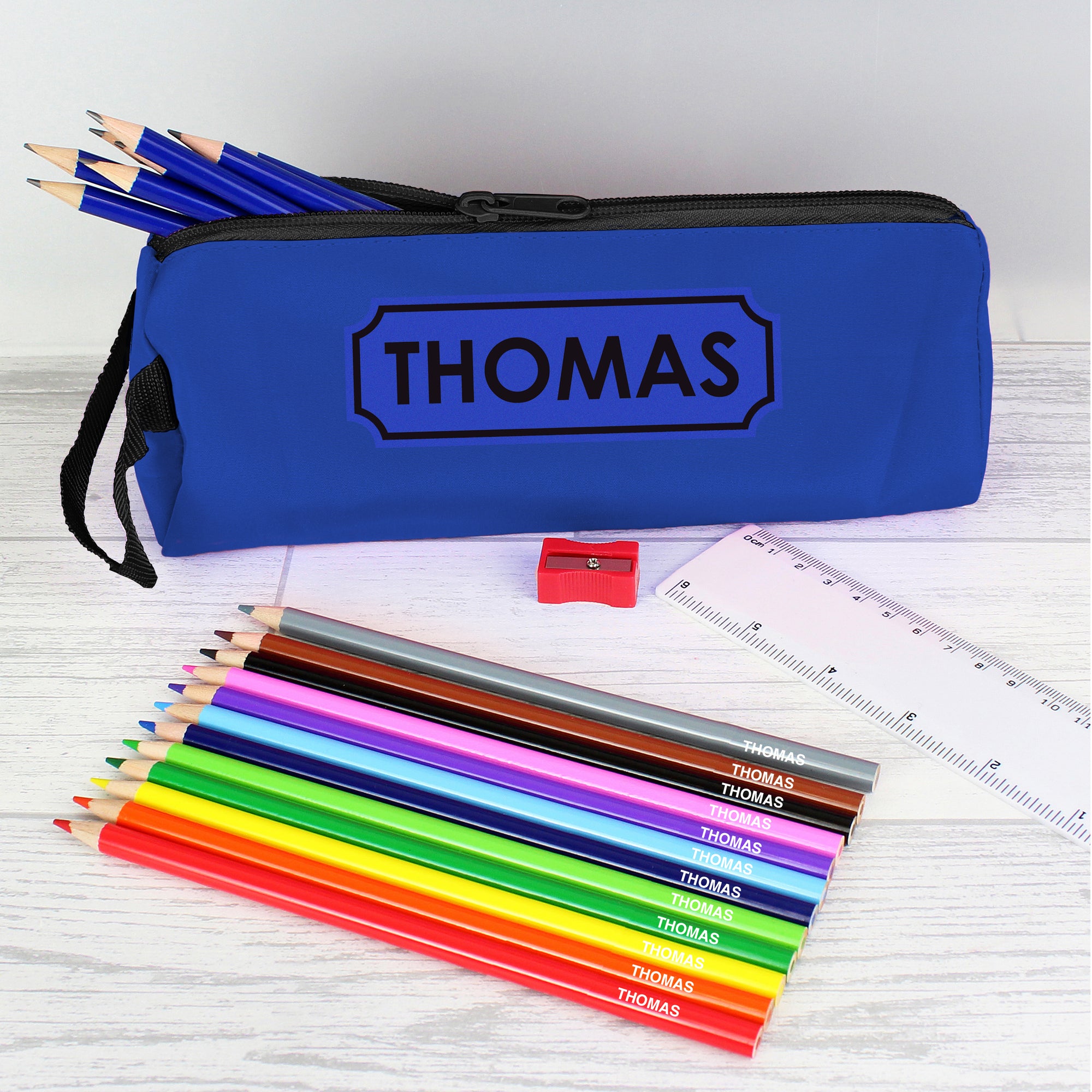 Personalised blue pencil case with personalised colouring and HB pencils plus a ruler and pencil sharpener