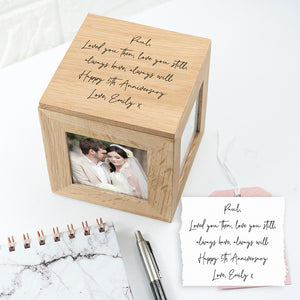 Image of an oak photo cube and keepsake box. You can put a photo into each of the four sides of the cube and the lid of the cube can be engraved with your own handwritten message. The inside of the box can be used to store small mementos.