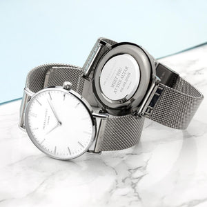 personalised mr beaumont watch with metallic silver mesh strap and white dial engraved with serif font