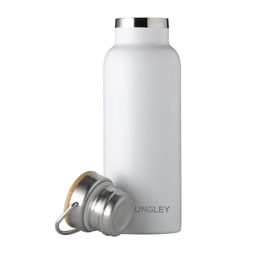 Personalised matt white insulated drinks bottle with a double wall and a bamboo vacuum screw top lid. The side of the bottle can be engraved with a name of your choice in uppercase.